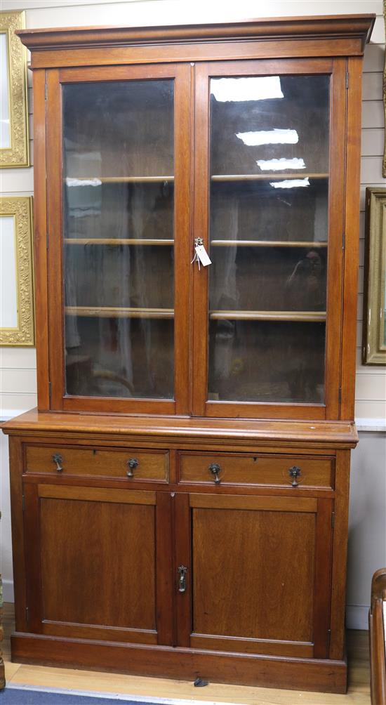 An Edwardian walnut bookcase W.123cm